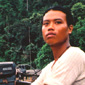 Their guide takes them by water to the jungle entrance of the cave 