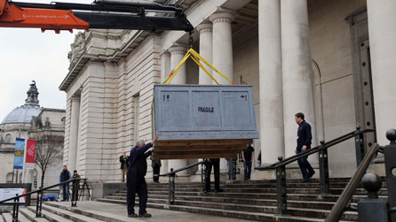 Stone carving being delivered to the museum