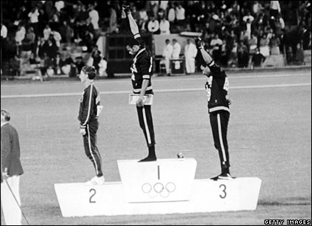 Tommie Smith and John Carlos stage their famous protest at the 1968 Olympics