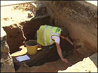 archaeologist digging