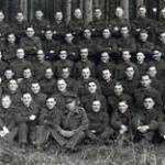 No. 2 Hut, Niklasdorf, East Sudetenland. The prison camp strength — 500 men. Photo shows our medical officer centre of front row