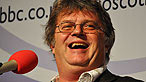 Paul Merton on stage at the EICC for MacAulay and Co.