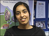 Teeange Pakistani girl looking into camera