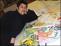 Ibrahim shows off some of his own art