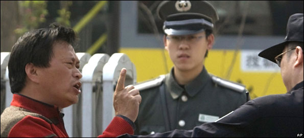 Protestor and police outside Peking University