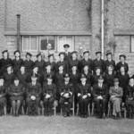 The Navy Stores staff with Commander Boyd front row centre