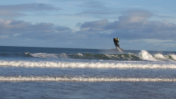 The area is popular with water sports enthusiasts, including this jetskier who is making the most of the choppy waters.