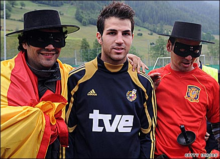 Fabregas poses for photos with Spanish fans