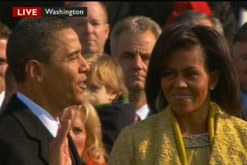 Barack Obama is sworn in as the 44th president of the United States as his wife Michelle stands next to him.