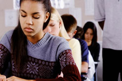 Schoolgirls sitting an exam