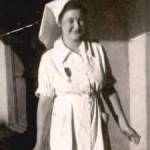 Sister Peggy Tench outside the Smallpox Isolation Hospital in the Assam Jungle 1944