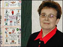 Pic: Gail Adcock with the tapestry.