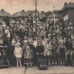 The Residents of Highfield Road, Collier Row, Romford in Essex Celebrating VJ Day in August 1945 with a Street Party
