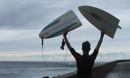 Two-piece. Mark feels the fierce power of Jardim. [This 7 2' snapped like a twig, and the swim back in was a lesson in the power of the Atlantic]