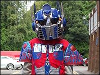 A boy dressed as a Transformer
