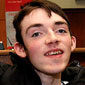 A 19 year old Donovan at a cheque giving event for NI Hospice