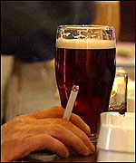 Smoker with beer glass