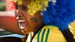 A woman with the South African flag painted on her face