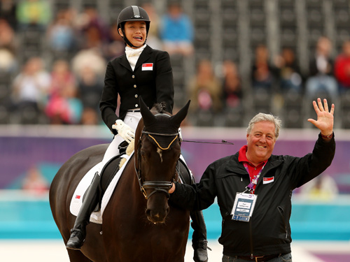 Laurentia Tan (left) competes in London 2012 Paralympic dressage