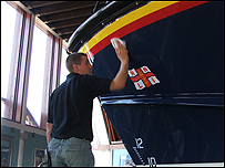Lee Firman gives the lifeboat a polish!