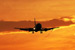 Plane in the sunset