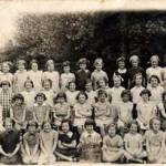 Pupils from Moston Lane School Manchester c. 1938/39. The whole school was evacuated in the week war was declared. Eunice Foster is 5 in from the left in the second row from the back