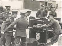 A gun crew under going training at the battery