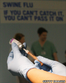 A swine flu vaccination is prepared