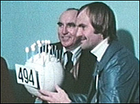 Mick Mills is given a cake to mark his 494th match