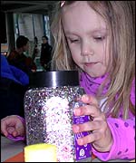 Child enjoying First Sunday event