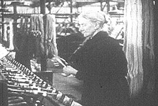old lady in a spinning room