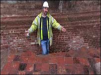 Julian Bowsher with uncovered chapel floor