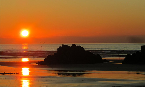 Morfa Bychan sunset by Jaqueline Lane.