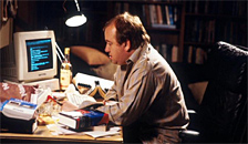 Man sitting at a desk: 