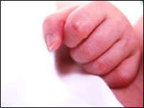 Newborn baby's hand.