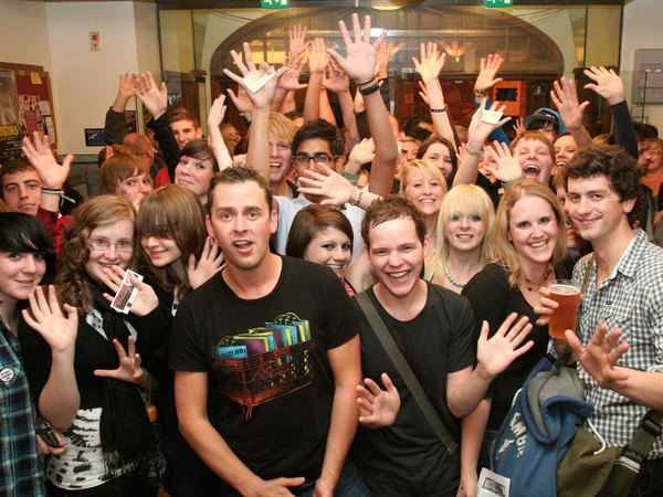 The fans pose with Scott, Becky and Joe