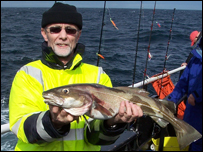 Fisherman with his catch