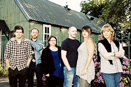 The Village Social cast members: Gwydion Rhys, Darren Lawrence, Rebecca Harries, Oliver Wood, Carys Eleri and Sue Roderick. Image: Warren Orchard/National Theatre Wales