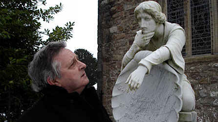 Phil Carradice next to Gwyneth Morgan's memorial