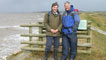 Derek and Rick standing alongside the sea wall 