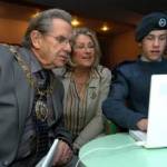 Mayor and Mayoress Jim and Brenda Smith log on to BBC People's War website with Cpl Peter Thompson, 17, a member of Crawley 19th Sqdn ATC