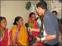 BBC reporters interviewing locals