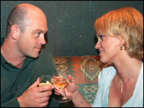 A man and woman drinking together