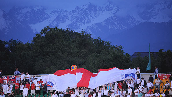 England fans in the ground in front of a beautiful mountain backdrop