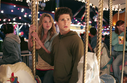 Kyle and Amanda on the merry-go-round