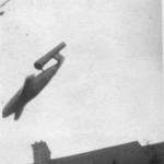 Model of V1 or Doodlebug in Flight, made by the author from plans obtained from the Science Museum and hung by a thread from the apple tree. Photo taken during the period they were falling.