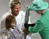 David beckham and Kirsty Howard present the Baton to the Queen