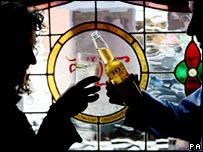 Couple drinking in a pub