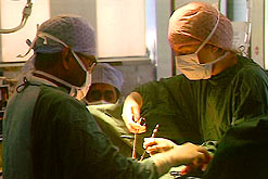 Surgeons in a operating theatre
