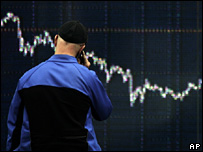 Man watching share price index